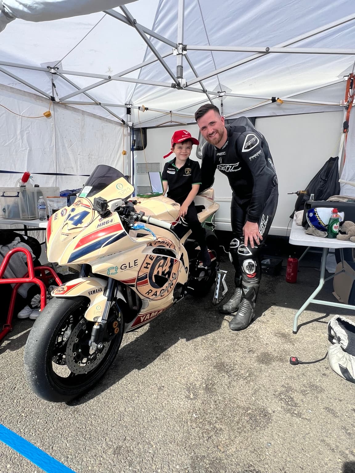 Hemphill Racing family paddock moment with the race bike