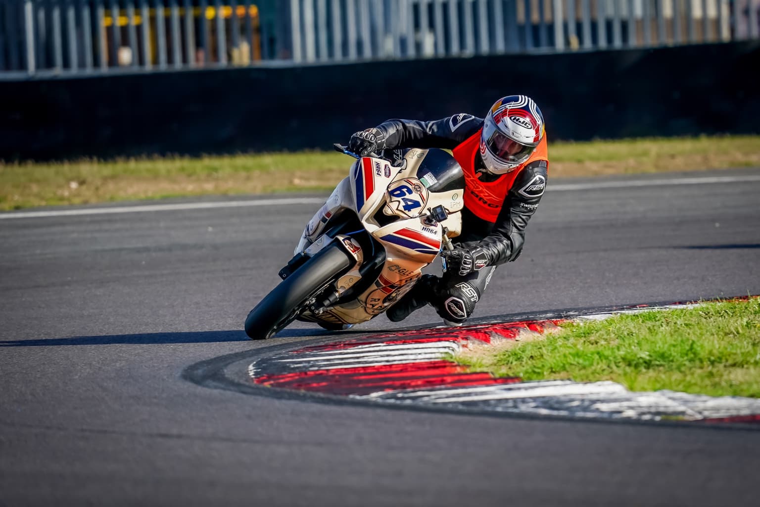 Number 64 Yamaha YZF-R6 on circuit